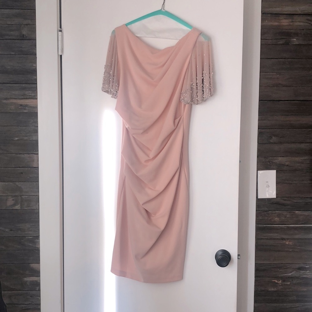 Blush colored short ruched crepe dress with beaded sleeves. Worn one time.